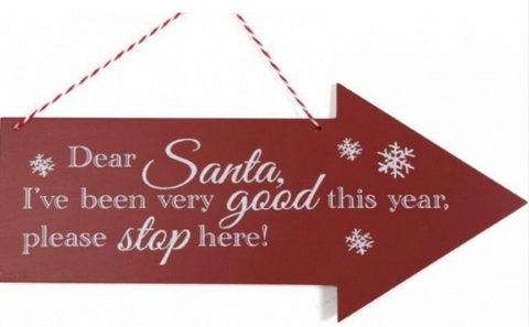 Dear Santa, please stop here, hanging red arrow sign