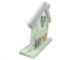 Side view of freestanding floral style house photo frame / plaque